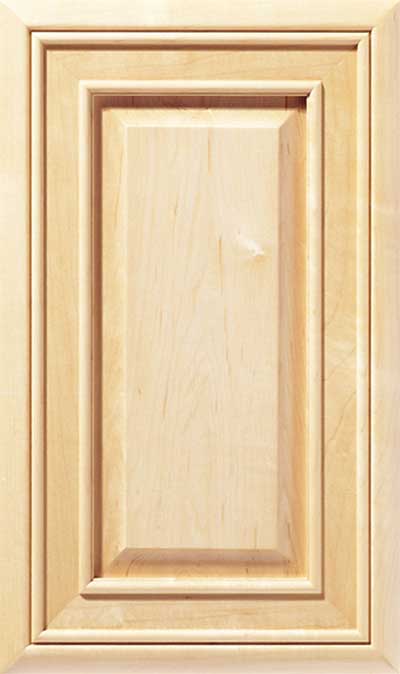 Rectangular wooden cabinet door with a raised panel and decorative molding, in a light natural wood finish.