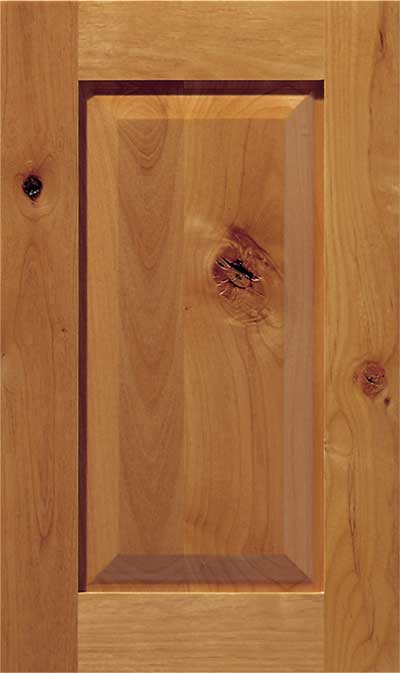 Wooden cabinet door with a recessed center panel and visible natural knots and grain patterns.