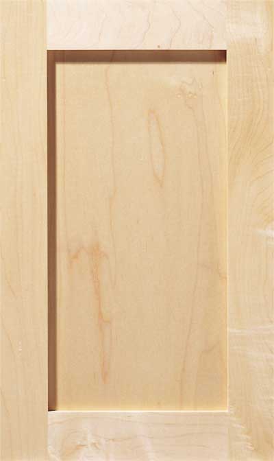 A light-colored wooden cabinet door with a simple, rectangular recessed panel design.